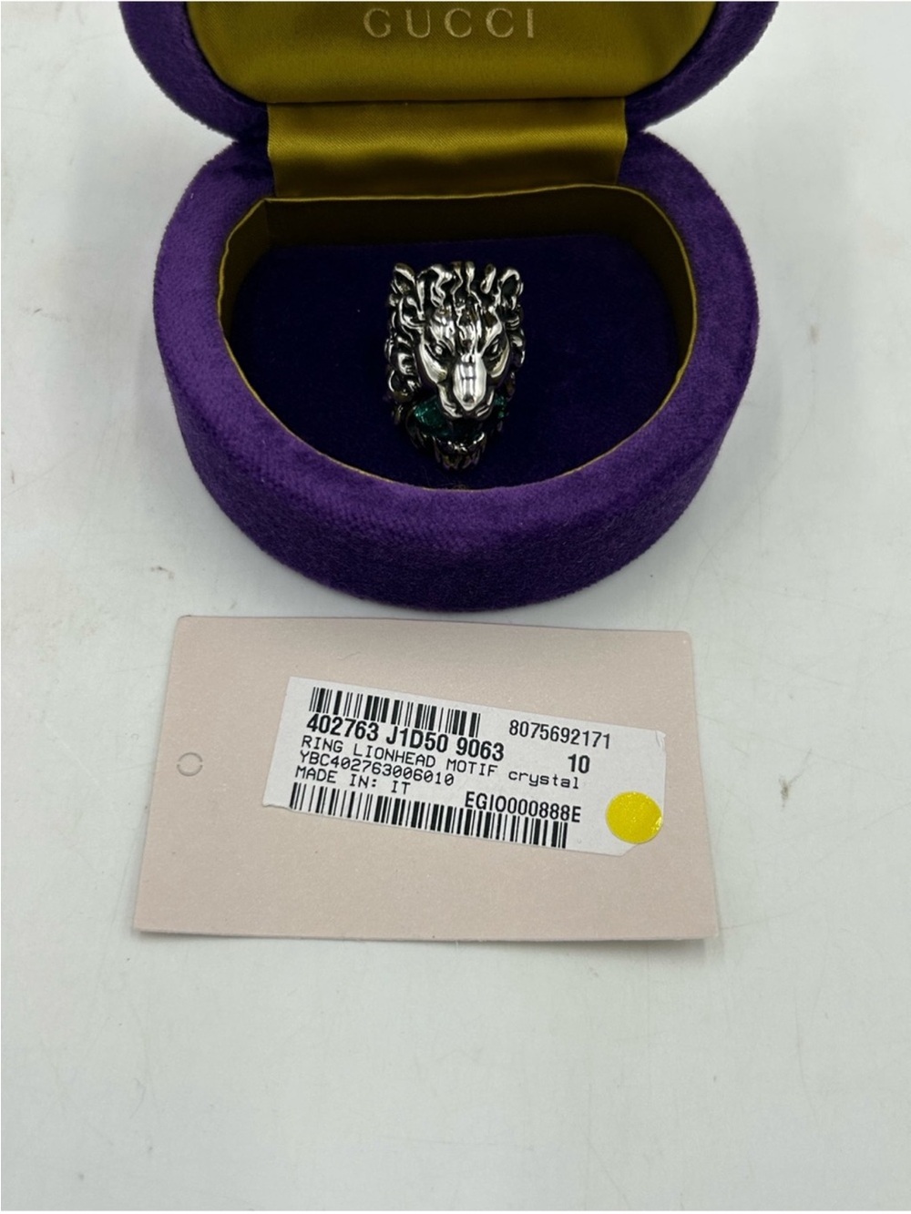 Unisex Gucci Silver Lionhead Ring with Green Crystal Detail